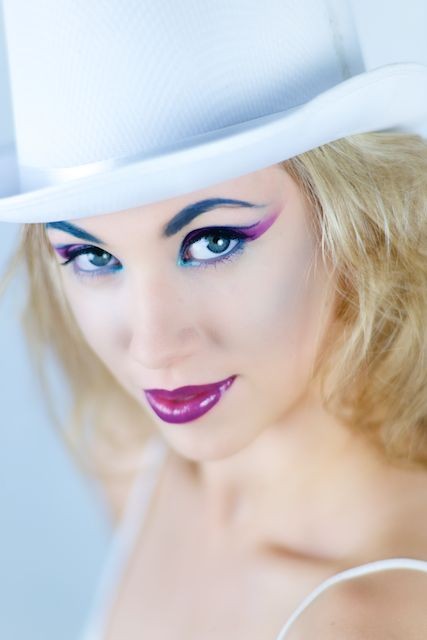 Purple lips with white hat by Adelaide mobile hair and makeup artist Make-Overs Australia